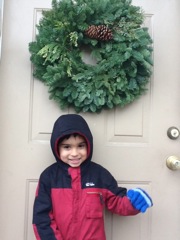 Austin with holiday door and wreath