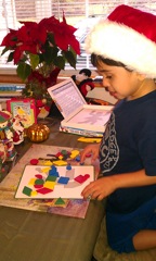 Austin on Christmas doing puzzle from Patty